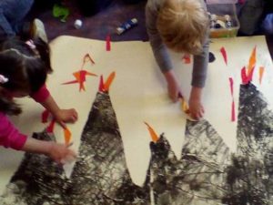 Children's Art School Juniors adding fire to a volcano