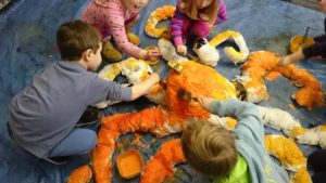 Our artists creating an octopus