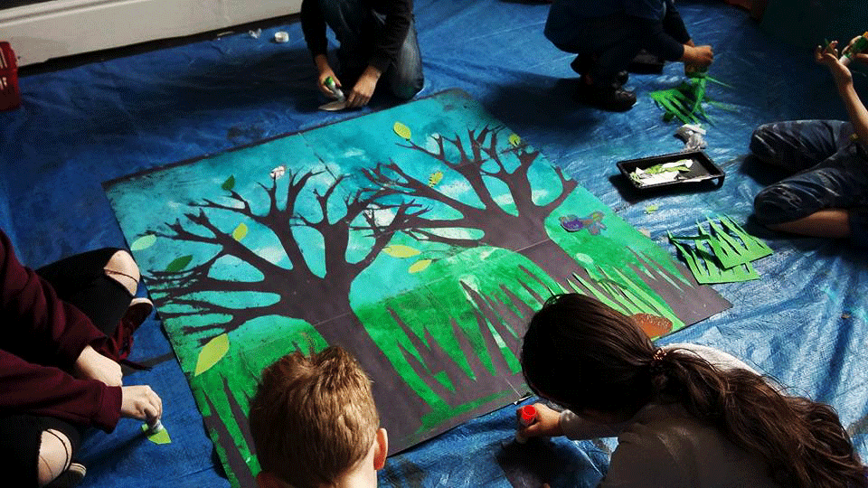 Children working on their Huddersfield Parks artwork